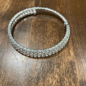 Bling wrap bracelet. Silver, faux diamonds are very sparkly. No tarnishing.
